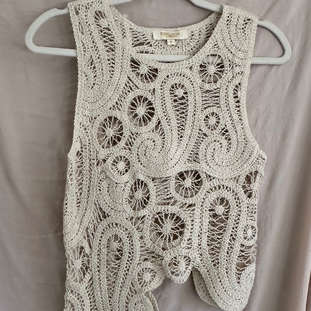 Asymmetrical cream sleeveless top